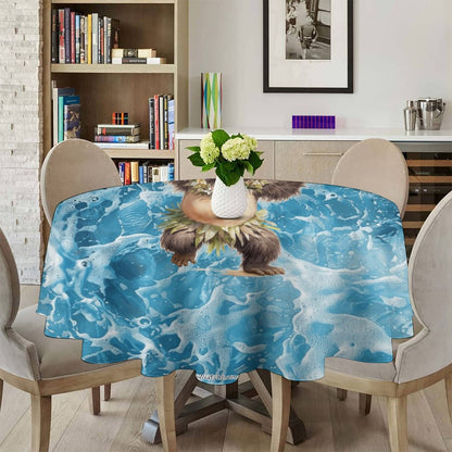 Sasquatch Hula On the Beach Round Tablecloth on Round Table
